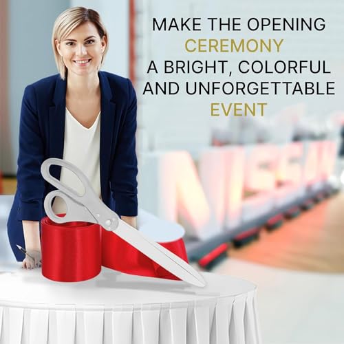 Silver-handled scissors paired with red ribbon for ribbon cutting events