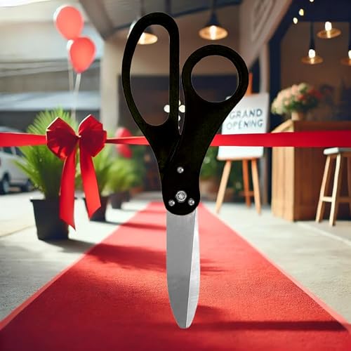 Grand opening scissors kit with black scissors and red ribbon