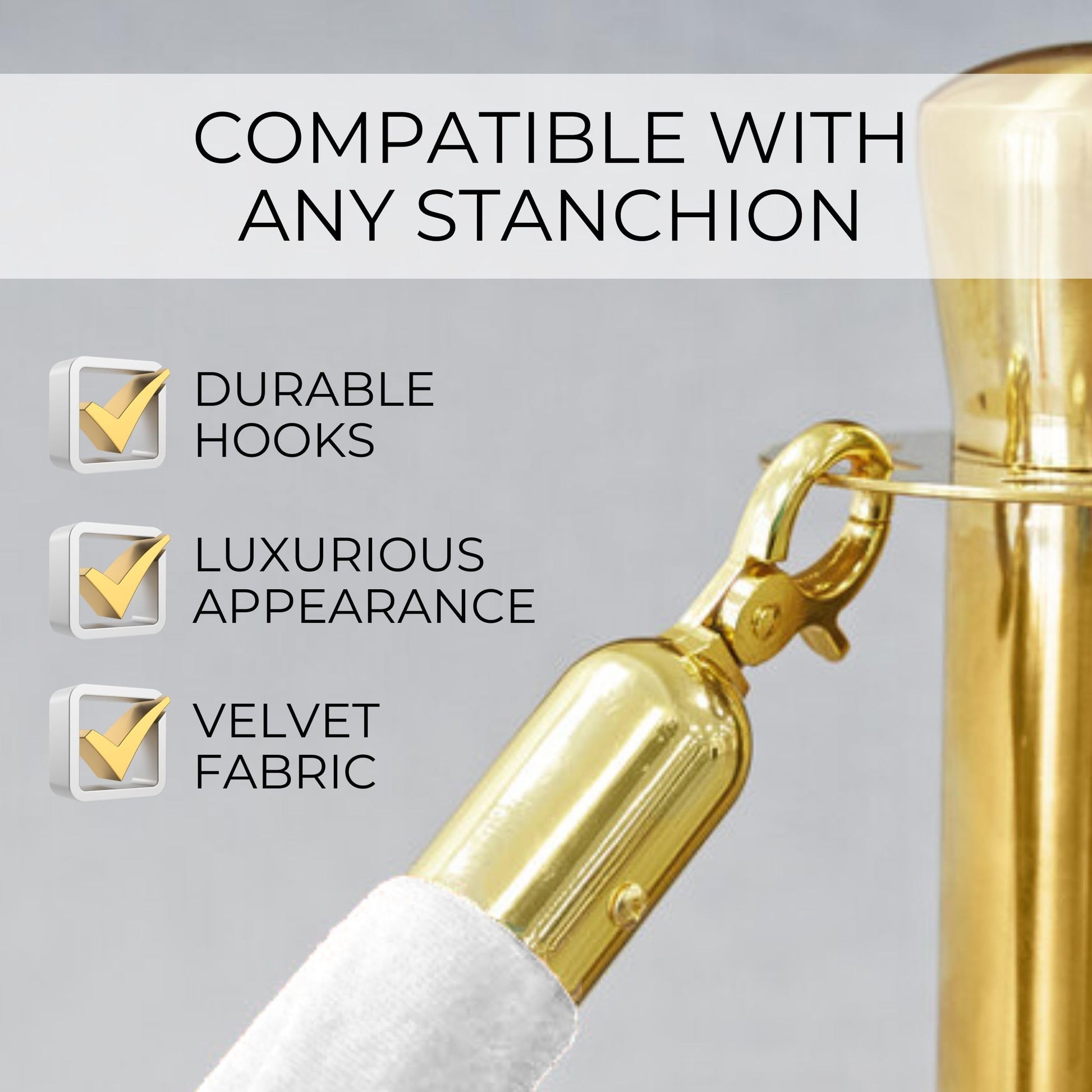White velvet rope with gold hooks connecting to brass stanchion post