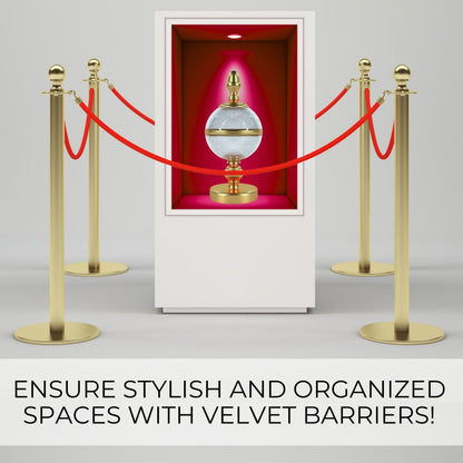 Gold stanchion posts with red velvet ropes surrounding a museum display pedestal