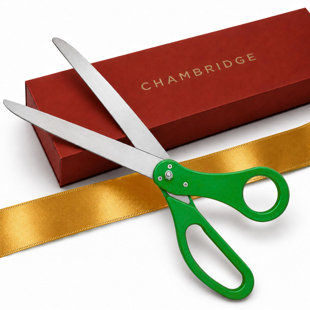 25-inch green ceremonial scissors with gold satin ribbon and red Chambridge gift box, white background